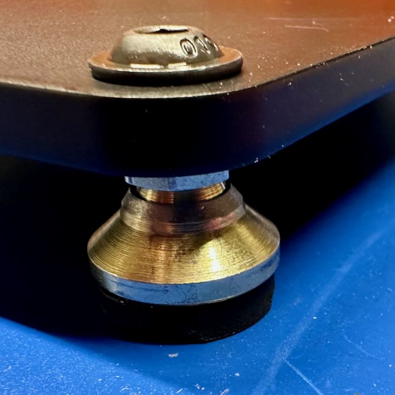 Leveling feet with a small button head screw
showing