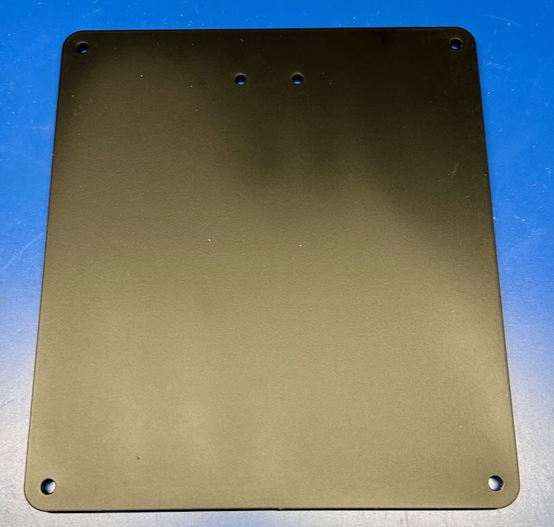 Custom powder-coated steel plate with 6 holes in 2
sizes